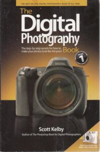 The cover of "The Digital Photography Book" by Scott Kelby, a top pick among the Best Books on Photography, offers practical tips and tricks for digital photographers.