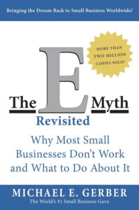 Cover of 'The E-Myth Revisited' by Michael E. Gerber, a crucial entrepreneurship book on small business management.