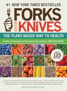 Cover of 'Forks Over Knives' by Gene Stone featuring a fork and knife crossed.