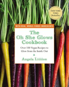 "Cover of 'The Oh She Glows Cookbook' by Angela Liddon featuring a vibrant dish.