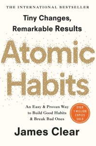 Atomic Habits: An Easy & Proven Way to Build Good Habits & Break Bad Ones" by James Clear The cover of "Atomic Habits" by James Clear, is a motivational personal growth book that provides strategies for building good habits and breaking bad ones.