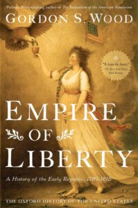 Cover of 'Empire of Liberty: A History of the Early Republic, 1789-1815' by Gordon S. Wood, with a depiction of an early American flag and a historical scene of the republic's founding.