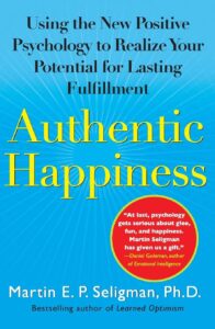 Cover of 'Authentic Happiness' by Martin E.P. Seligman, a foundational book on happiness exploring positive psychology principles for a fulfilling life.