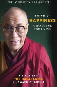 Cover of 'The Art of Happiness' by Dalai Lama and Howard Cutler, one of the best books on happiness combining spiritual wisdom and scientific approach to achieve inner peace and happiness.